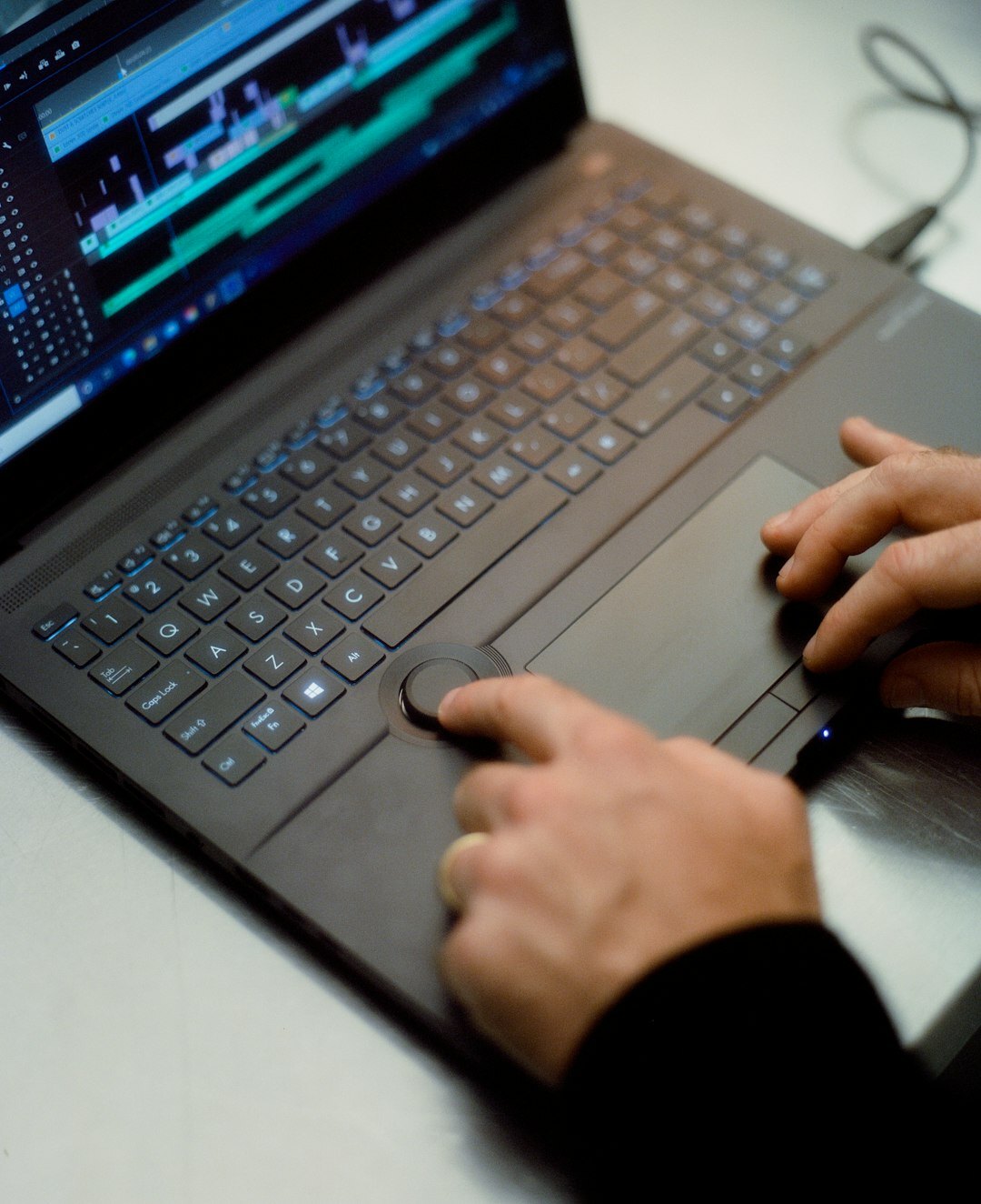 filmmaker editing video on computer